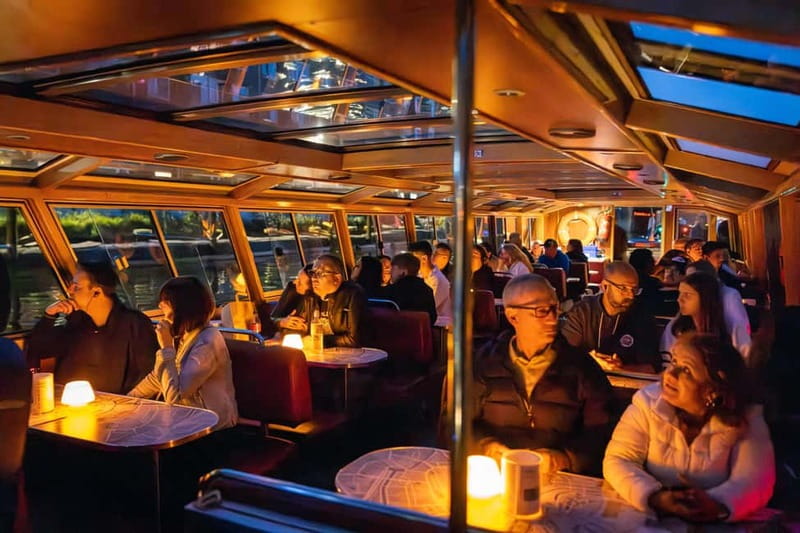 Amsterdam: Evening Cruise with Optional Wine and Snacks - On Board Experience: 19-Language Audio, Earphones, and Cozy Comfort