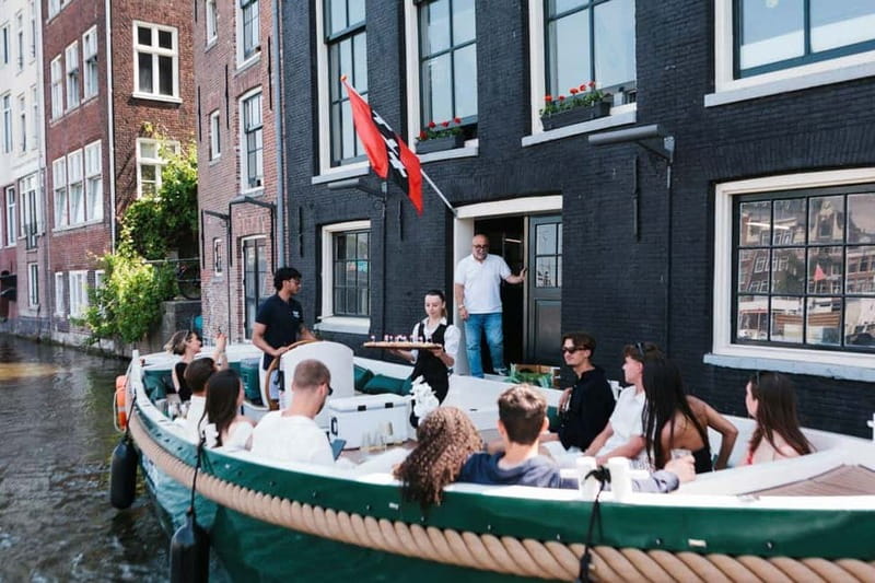 Amsterdam Evening (Sunset) Canal Cruise w/ optional drinks - The Route Highlights: Skinny Bridge, Dancing Houses, and More Illuminated Water Views