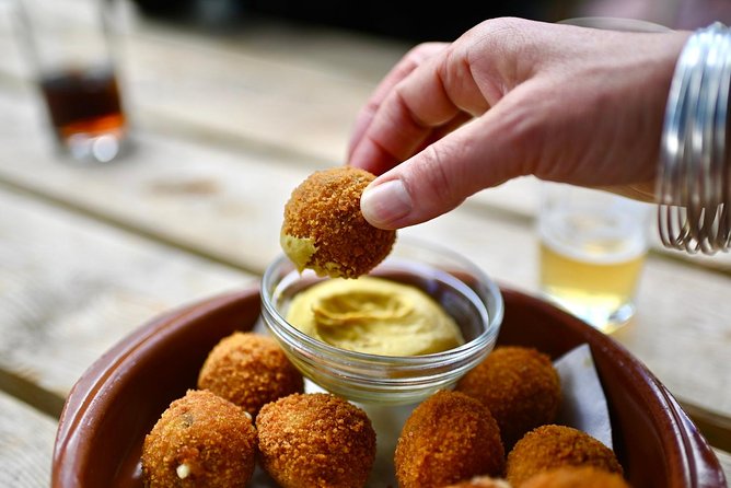 Amsterdam Food Tour of 10+ Local Classic Tastings in Jordaan Area - Beverages, mobile ticket, and what the small-group cap changes