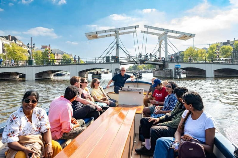 Amsterdam: Guided City Highlights Open Boat Canal Cruise - Key highlights to look forward to