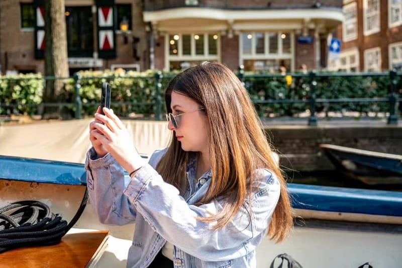 Amsterdam: Guided City Highlights Open Boat Canal Cruise - Open-boat comfort and photo tips that actually help