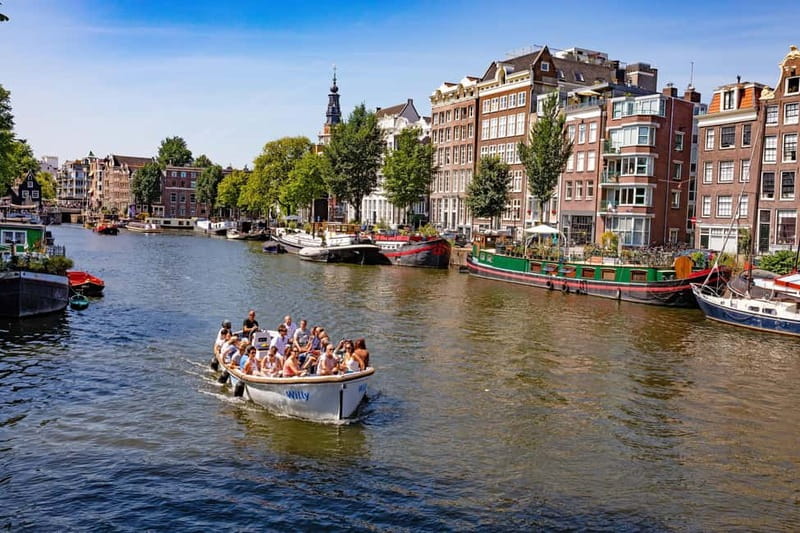 Amsterdam: Guided City Highlights Open Boat Canal Cruise - Should you book this Amsterdam open-boat canal highlight cruise?