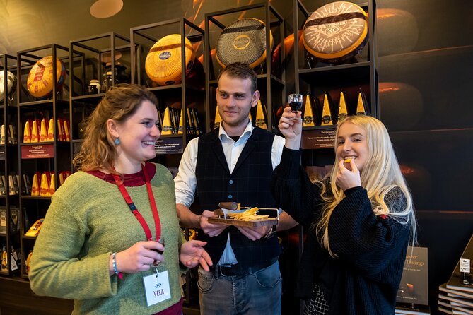 Amsterdam : Guided Cultural Food Tour - Royal Palace and Oude Kerk: monarchy, the oldest church, and the red light district