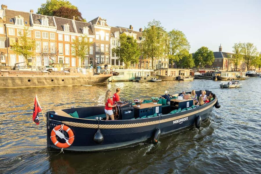 Amsterdam: Guided Open Boat Cruise Unlimited Drinks Option - Where You Meet at Amsterdam Centraal, and How to Not Lose Time