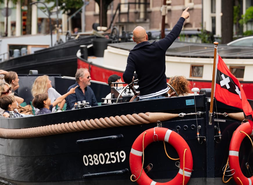 Amsterdam: Guided Open Boat Cruise Unlimited Drinks Option - Live Commentary That Keeps the Ride From Feeling Like Just Photos