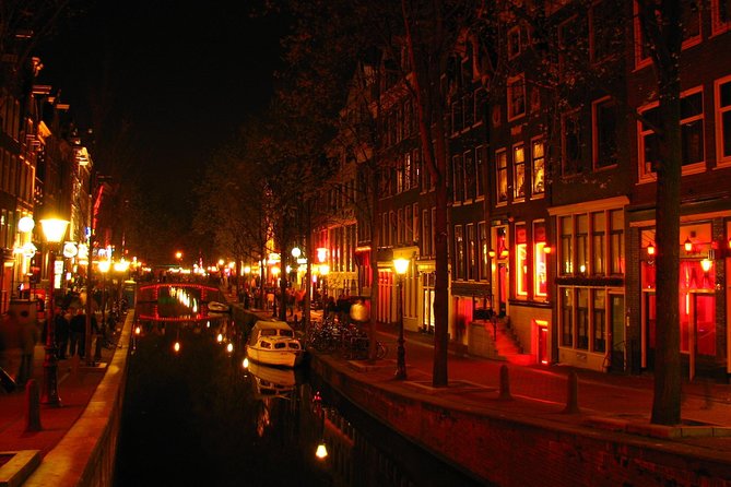 Amsterdam: Guided Red Light District and City Walking Tour - Condomerie stop: modern shopping placed right inside the story