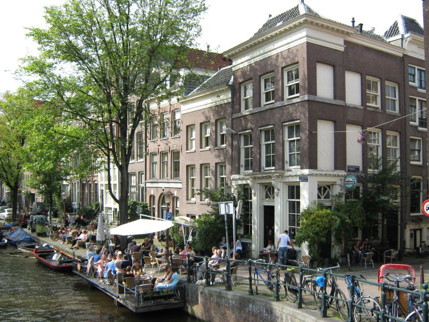 Amsterdam: Guided Sightseeing Bike Tour - Canals and center-city icons: from classic waterways to Westerkerk