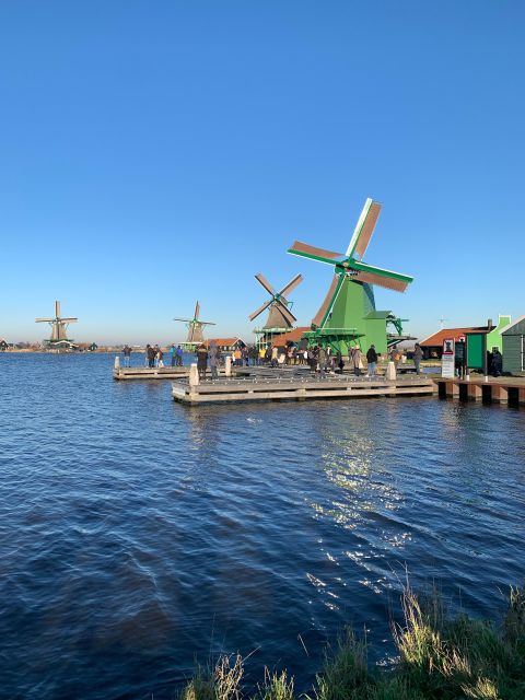 Amsterdam: Guided Zaanse Schans, Windmills & Cheese Tour - Village stroll and windmills: what you get, what costs extra
