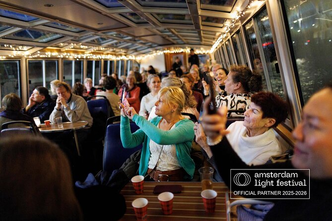 Amsterdam: heated Light Festival Cruise | Incl. Drinks Option - Westerkerk to the Houseboat Museum: Churches and Canal Life