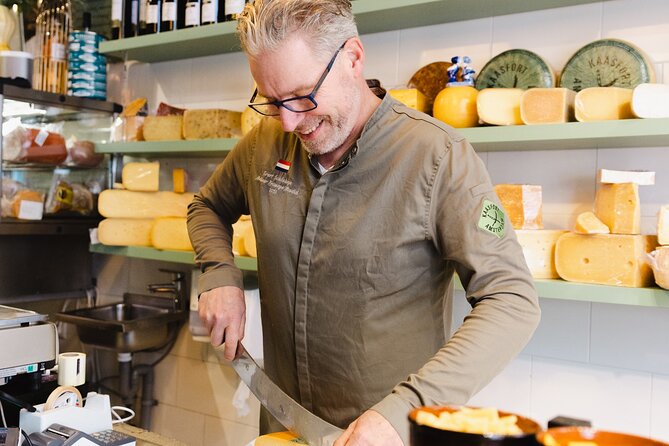 Amsterdam High-End Dutch Food & History Tour - Up to 8 guests - Cheese and wine in a private speakeasy room