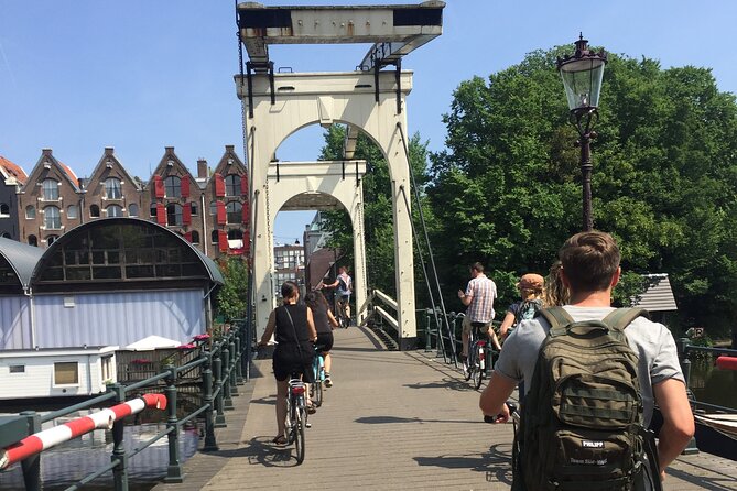 Amsterdam Highlights Bike or E-Bike Tour - Centraal Station to Prinseneiland: harbor views and drawbridges