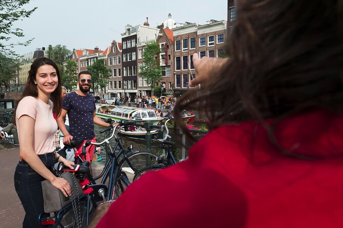 Amsterdam Highlights Bike Tour - Guided in EN/ES/DE/NL - Skinny Bridge (Magere Brug): The Icon Moment