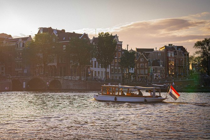 Amsterdam Highlights Canal Cruise with a Drink - The classic boat and the comfort details you will actually care about