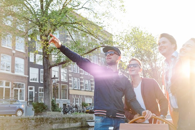 Amsterdam Highlights Canal Cruise with a Drink - Meeting at H’ART Museum on Amstel 51, then right onto the boat