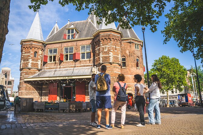 Amsterdam Highlights Small-Group Walking Tour - Begijnhof Gardens at Spui Square: a quieter reset