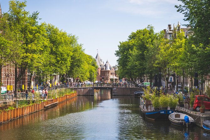 Amsterdam Highlights Small-Group Walking Tour - Optional 1-hour canal cruise: when water beats walking