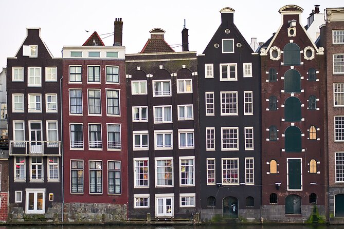 Amsterdam Highlights Walking Tour - Dam Square: Royal Palace, National Monument, and street life