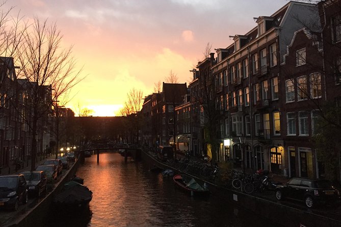 Amsterdam Highlights Walking Tour: Small Group Experience - Stop 1, WOW Tours area: big retail, city movement, and a quick reset