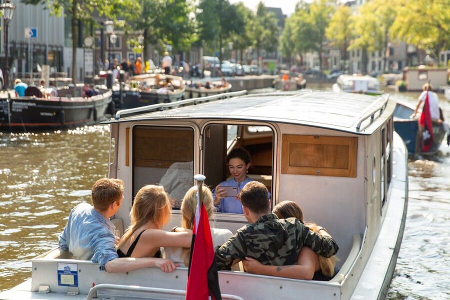 Amsterdam: Historic Boat Cruise with open bar and nibbles - Why This 12-Person Boat Cruise Feels Different Than Big Canal Tours