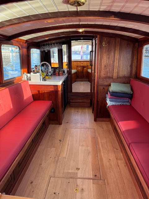 Amsterdam: Historic Boat Cruise with open bar and nibbles - Captain Bow And The Cast Of Guides You Might Meet