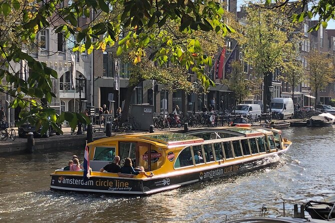 Amsterdam: Historic City Sightseeing Canal Cruise - The canal houses and bridge moments that you can actually point to