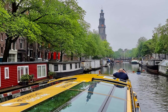 Amsterdam: Historic City Sightseeing Canal Cruise - Amsterdam Centraal and the IJ: the city turns outward