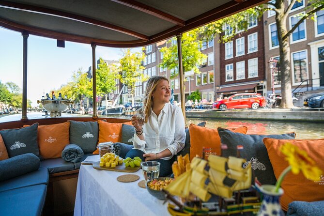 Amsterdam Historic Tour On Classic Saloon Boat - Gliding Past Iconic Areas, Then Under the Skinny Bridge