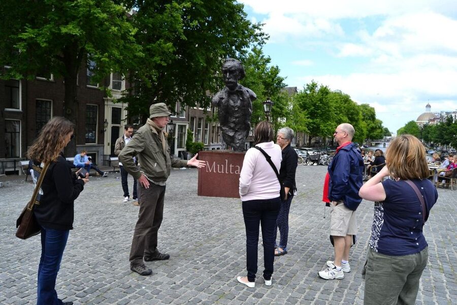 Amsterdam: History, Culture & Hidden Gems Walking Tour - Chinatown to Nieuwmarkt: how trade routes become street life