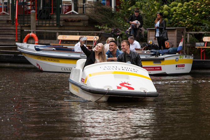 Amsterdam Independent Sightseeing by Pedal Boat - Weather, covers, and what to bring so you are comfortable