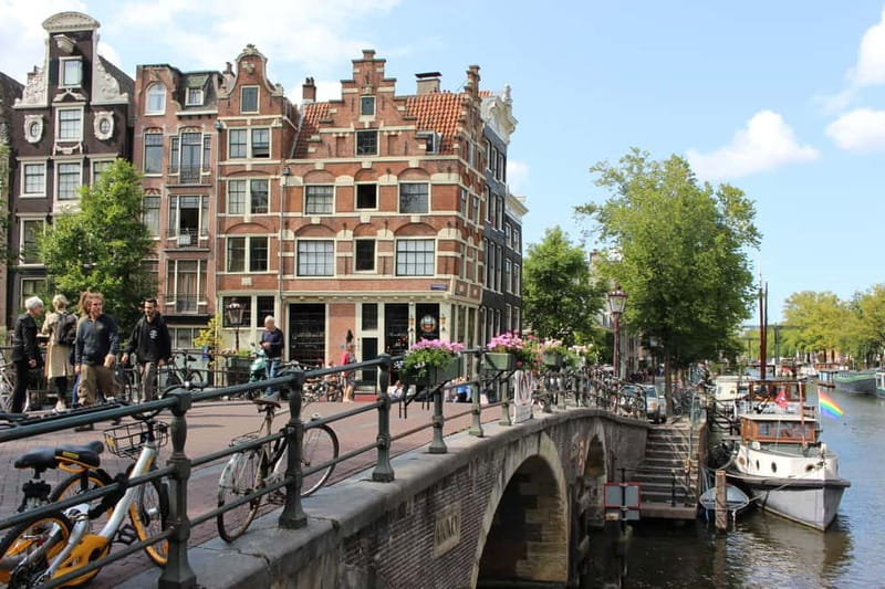 Amsterdam: Jordaan Area Walking Tour - Torensluis Bridge to Herengracht: The Canal-Belt Basics, Explained Clearly