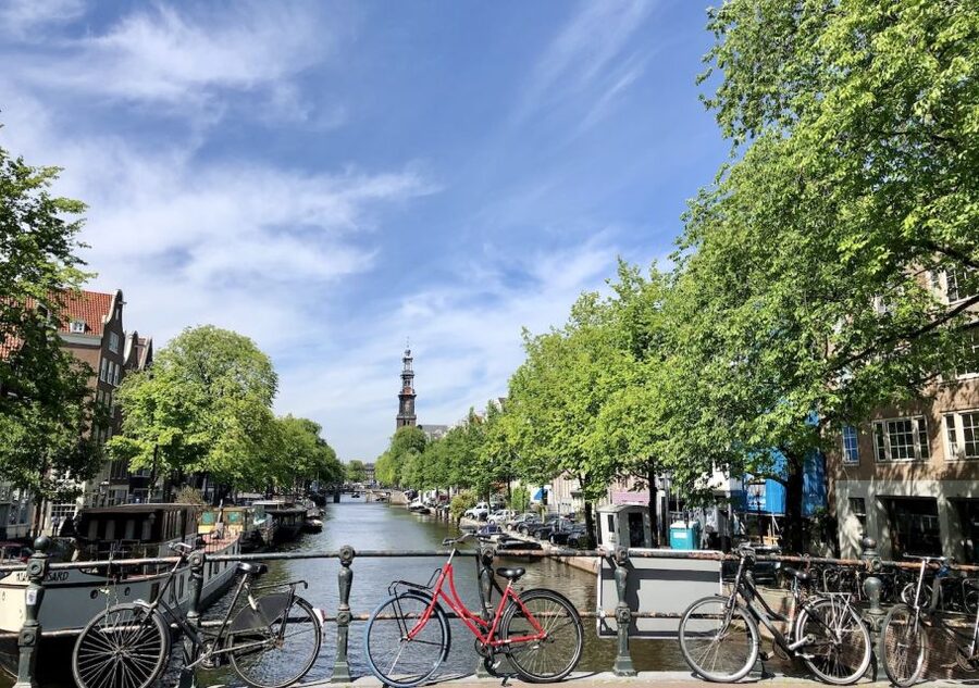 Amsterdam: Jordaan District Tour with a German guide - The neighborhood shift: from working-class streets to today’s desirable Jordaan