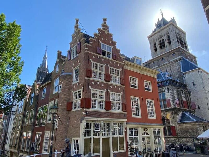 Amsterdam: Kinderdijk, Euromast, Delft and Den Haag Day Tour - A fast sampler of South Holland, starting in De Ruijterkade