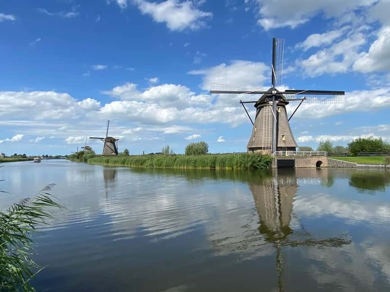 Amsterdam: Kinderdijk, Euromast, Delft and Den Haag Day Tour - Kinderdijk UNESCO: 19 windmills and what 105 minutes really means