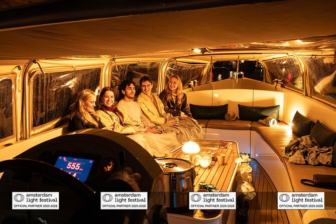 Amsterdam: Light Festival Boat with Unlimited Drinks & Snack - Staying Warm Without Missing the Fun