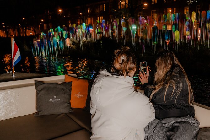 Amsterdam Light Festival: Canal Cruise + Bite & Unlimited Drinks - Learning the Light Festival Artworks Without Being Overloaded