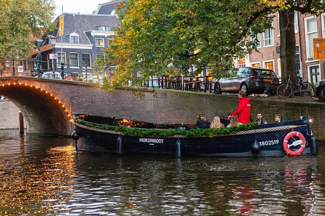 Amsterdam: Light Festival Open Boat - Unl. Drinks Option - NEMO’s Hands On science vibe seen from the water