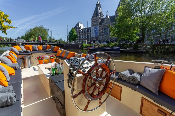 Amsterdam Light Festival: Saloon Boat Cruise + Hot Drinks & Bite - National Maritime Museum: The Start, the Landmark, and What It Means