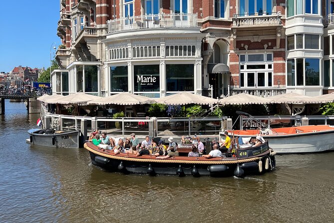 Amsterdam Luxury Boutique Boat tour with Unlimited Beer and Wine - Rembrandt’s years and the Oude Kerk: what you actually get by water