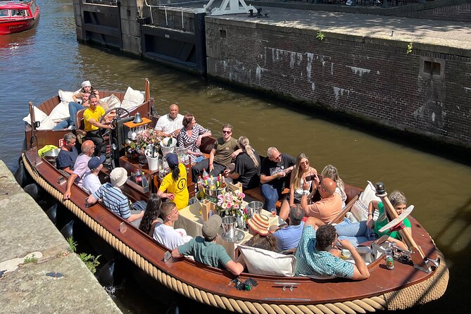 Amsterdam Luxury Boutique Boat tour with Unlimited Beer and Wine - Magere Brug, the Skinny Bridge, and how to get better photos