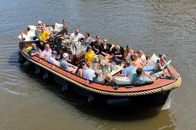 Amsterdam Luxury Boutique Boat tour with Unlimited Beer and Wine - Boat comfort: open vs covered roofs and why sightlines can vary