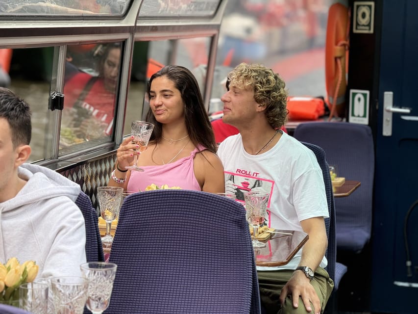 Amsterdam: Luxury Cheese & Wine Canal Cruise - The cruise itself: Amsterdam canals, iconic views, and historic architecture