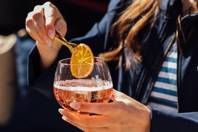 Amsterdam: Luxury Saloon Boat Cruise with Cocktails & Waffle - The guide experience, and the names to recognize