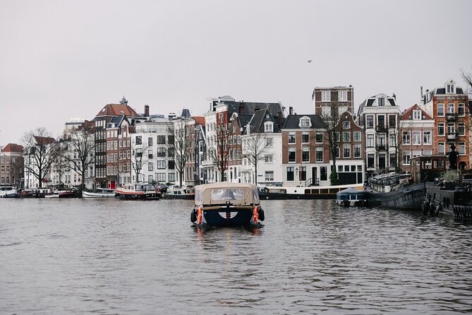 Amsterdam Newest Canal Cruise with local guide and small group - Practical Tips: What to Wear, What to Bring, and How to Spot the Boat