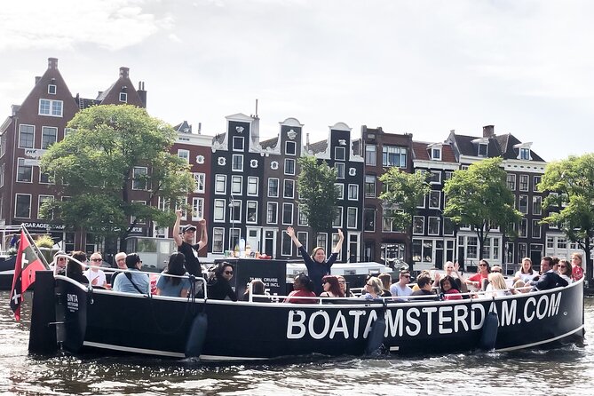 Amsterdam Open Boat Cruise in Old City Centre with Drinks Options - Open-air canal time, without the usual glass-wall effect