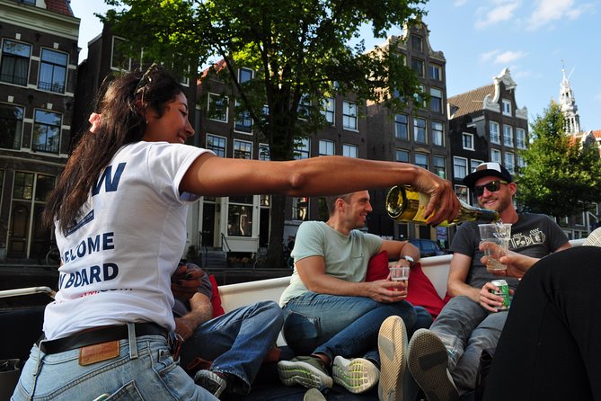 Amsterdam Open Boat Cruise with Live Guide and Two Drinks - Herengracht and Prinsengracht: The Canal-Ring Feeling in a Small Package