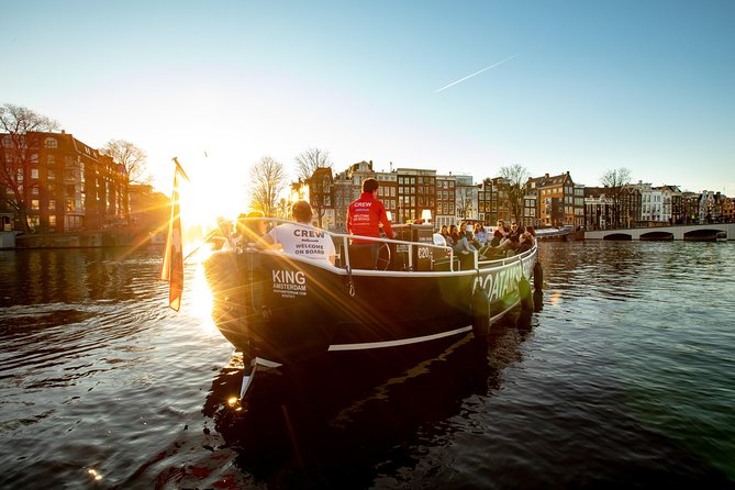 Amsterdam Open Boat Cruise with Live Guide and Two Drinks - Open-Air in Summer, Heated Seats in Winter, and How to Stay Warm