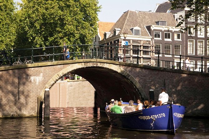 Amsterdam Open Boat Sightseeing Canal Cruise - Rijksmuseum and Amsterdam Centraal: Two Icons You Can Spot Fast