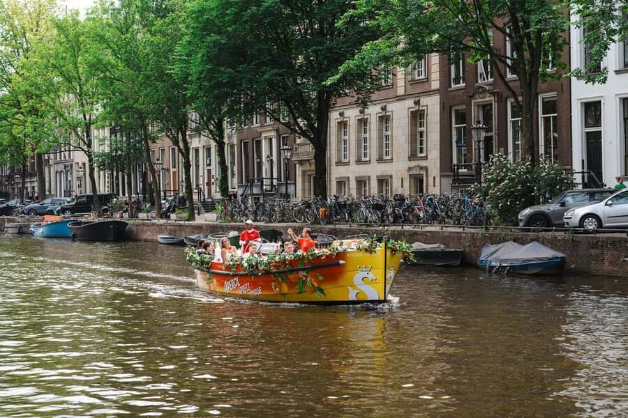 Amsterdam: Original Aperol & Limoncello Spritz Cruise - The 60-minute route, from Damrak through the canal highlights