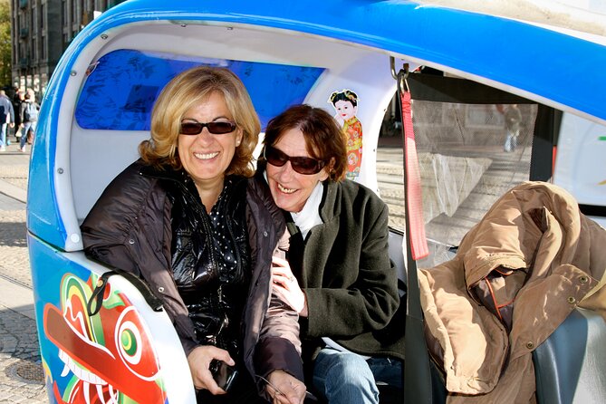 Amsterdam Pedicab City Tour (2 hours) - Nieuwmarkt to Montelbaanstoren: gates, watch towers, and canal views