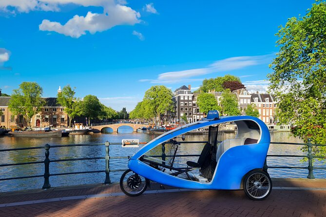 Amsterdam Pedicab City Tour (2 hours) - Dam Square, Zeedijk, and Chinatown: the old center in quick, meaningful stops